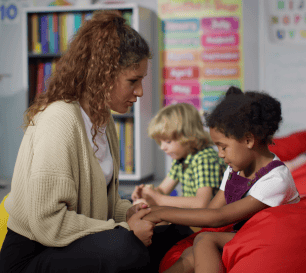 Child With Down Syndrome And Teacher