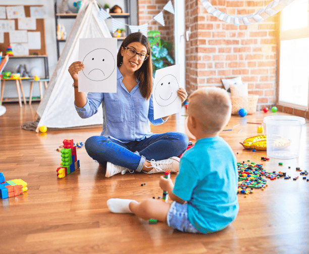 Family Talking To Therapist On Couch