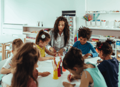 Girl Smiling While Doing Schoolwork