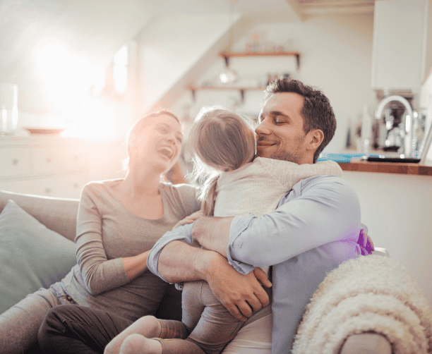 Parents Smiling During Therapy Consultation