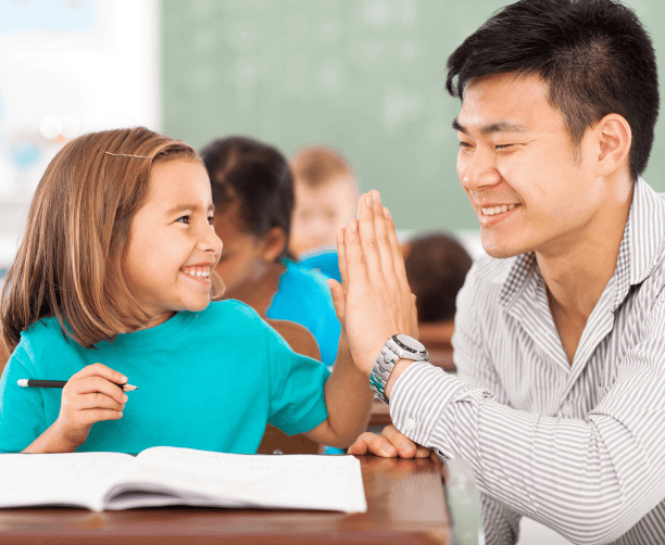 Student Overwhelmed Resting Head On Desk