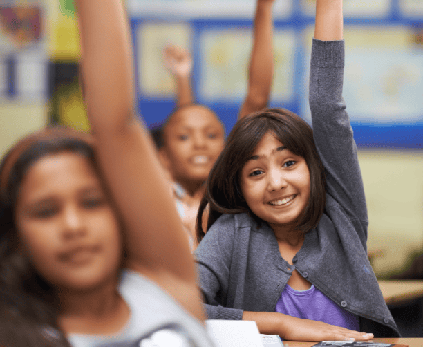 Teacher And Student Smiling With Open Book