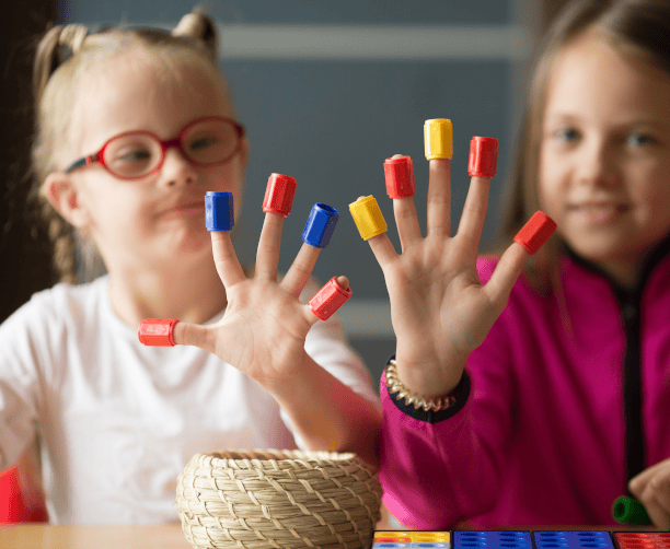 Teacher Calling On Classroom Of Engaged Students