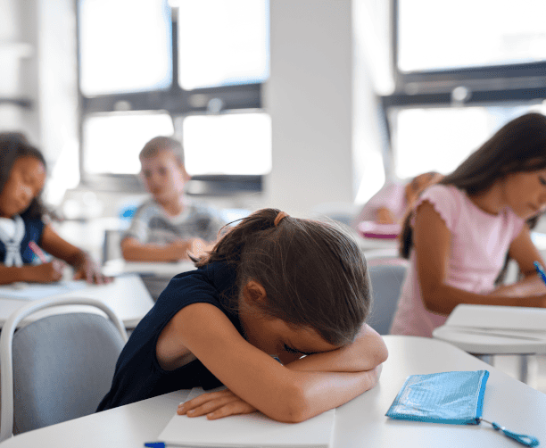 Teacher Guiding Students On Laptop Research