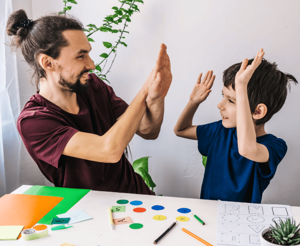 Therapist Playing Music With Child