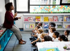 Woman Conducting Speech Therapy With Boy