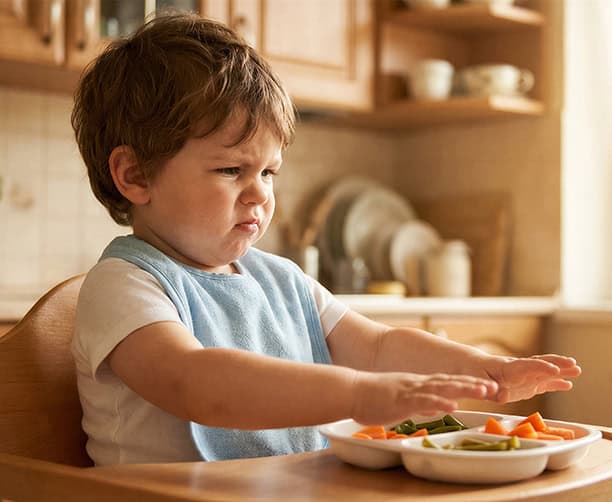 Toddlers Refeusing To Eat Food In Plate